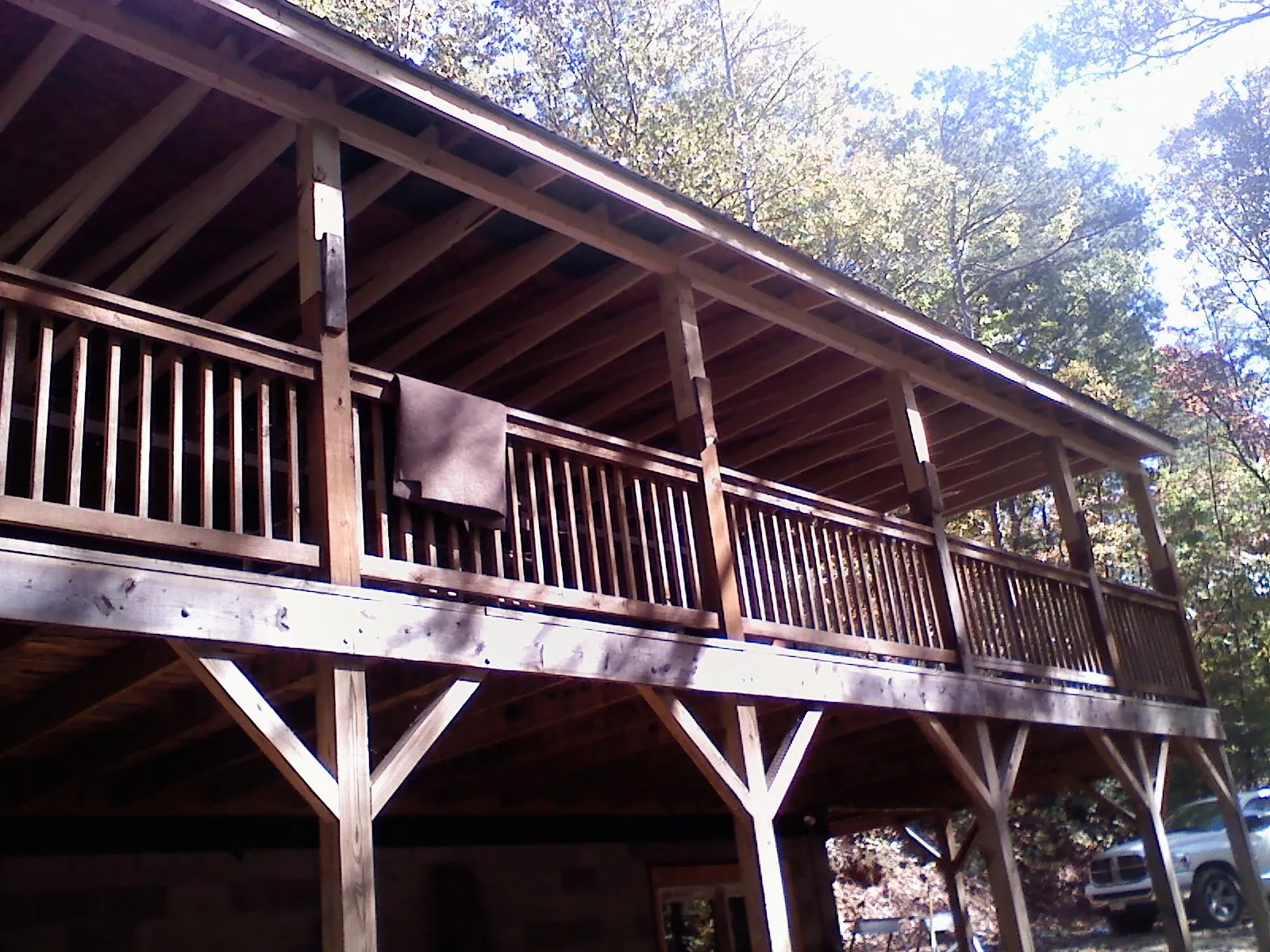 Timber framing under a new elevated porch and deck — Roof Leak Repair in Nielsville by Roofing Brothers